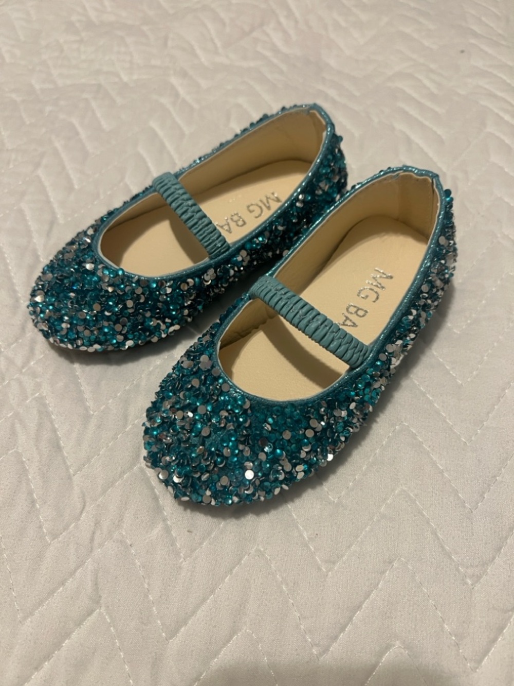 Never worn! MG Baby Teal Sequin Mary Jane Dress Shoes for toddler.
